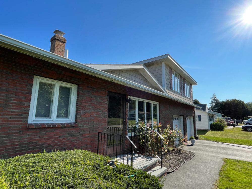 house-wash-gutter-brightening-and-downspouts-flushed-in-tewksbury-ma