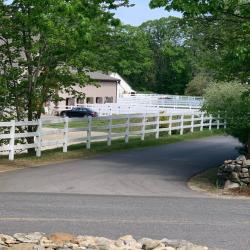 Soft Washing One Mile of White Vinyl Fence in Merrimack, NH